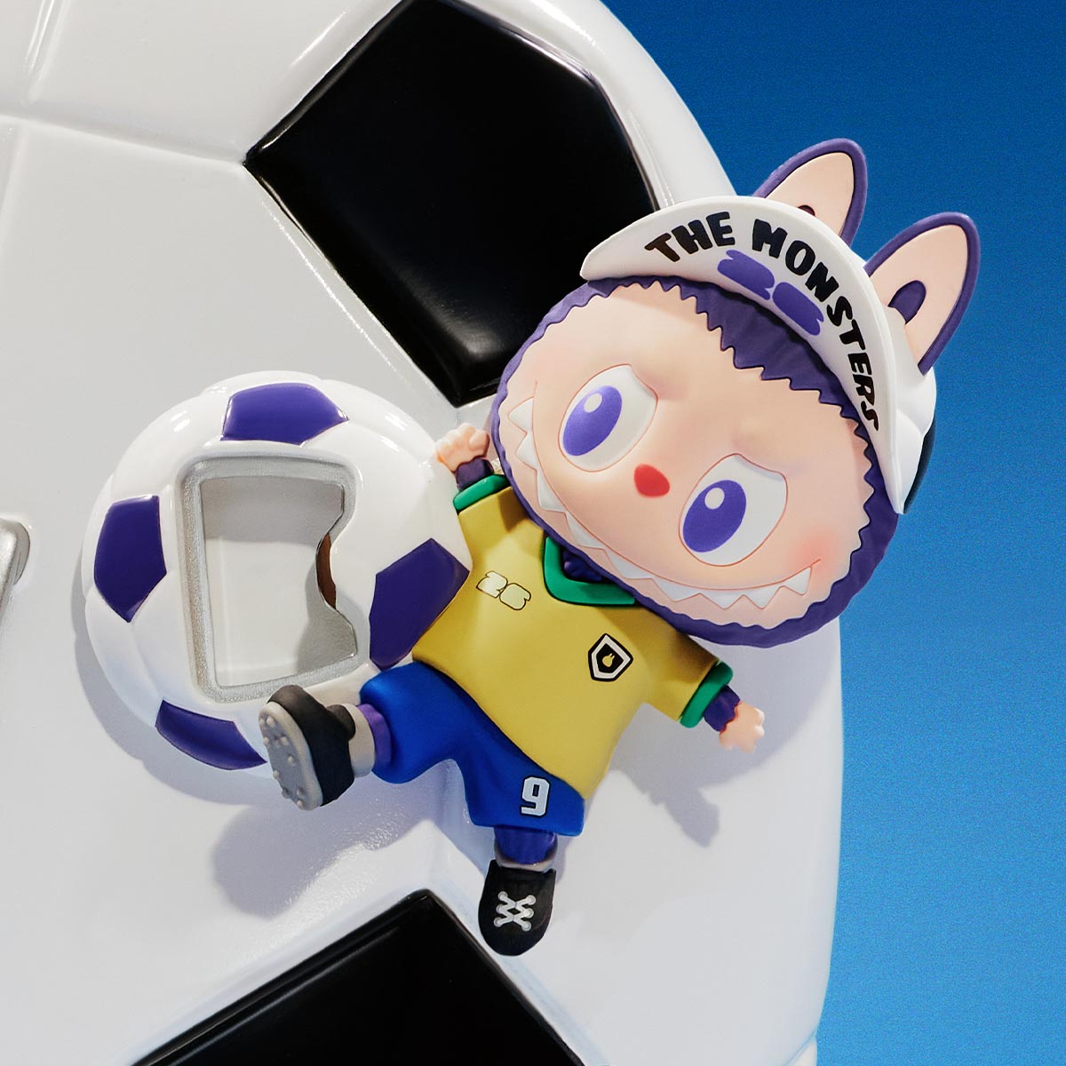 THE MONSTERS x FIFA bottle opener fridge magnet — one possible series design showing opener structure; not guaranteed set contents