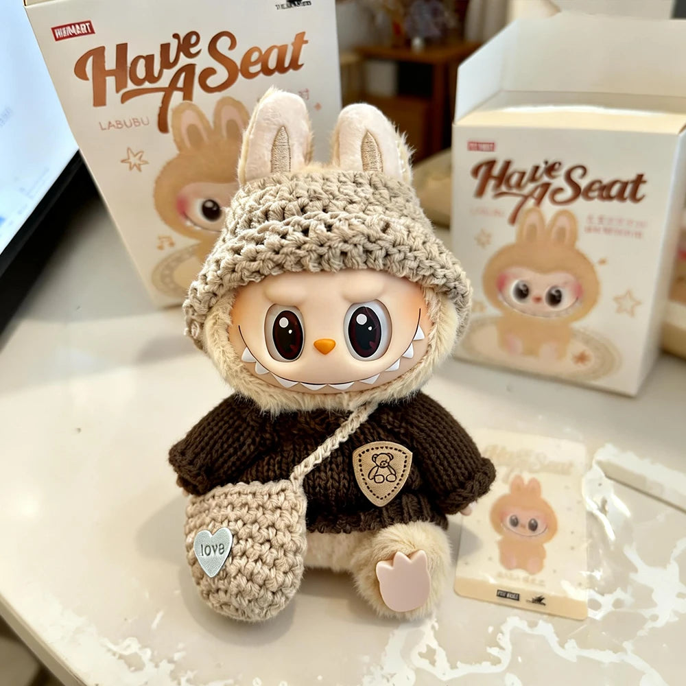 Handmade white knit doll outfit for Labubu 17cm featuring rainbow buttons, a matching beanie, and a heart crossbody bag.