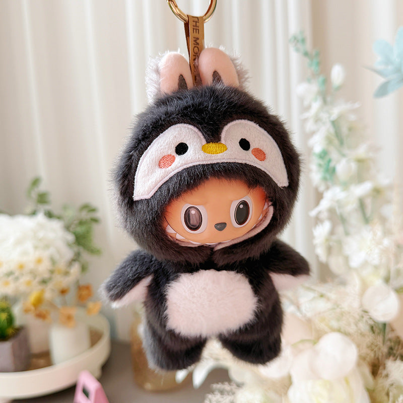 Labubu 17cm penguin onesie hanging keyring display - front view with flowers