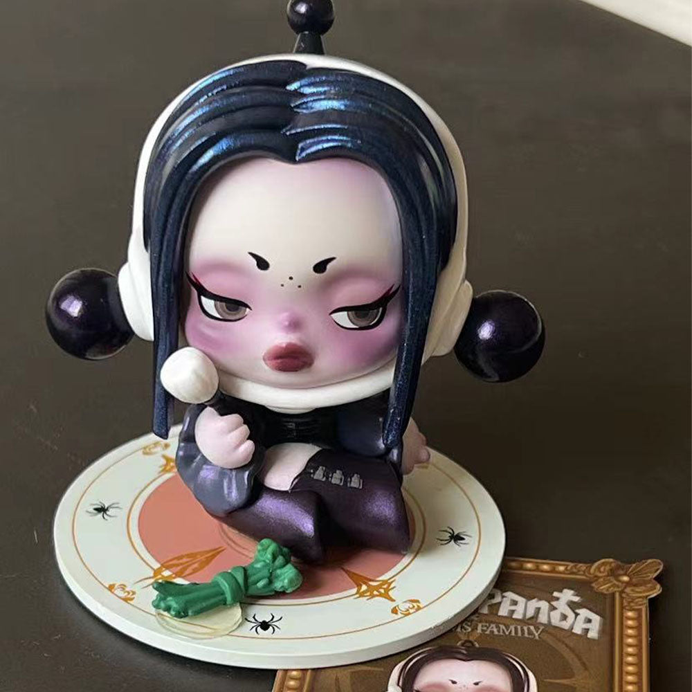 Skullpanda x The Addams Family series blind box figures including Wednesday, Morticia, and Uncle Fester.