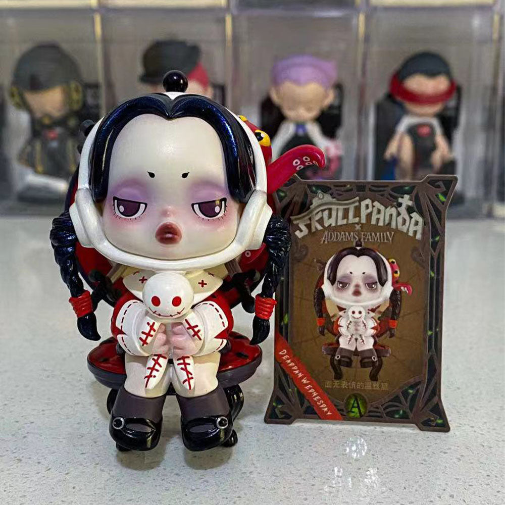 Skullpanda x The Addams Family series blind box figures including Wednesday, Morticia, and Uncle Fester.