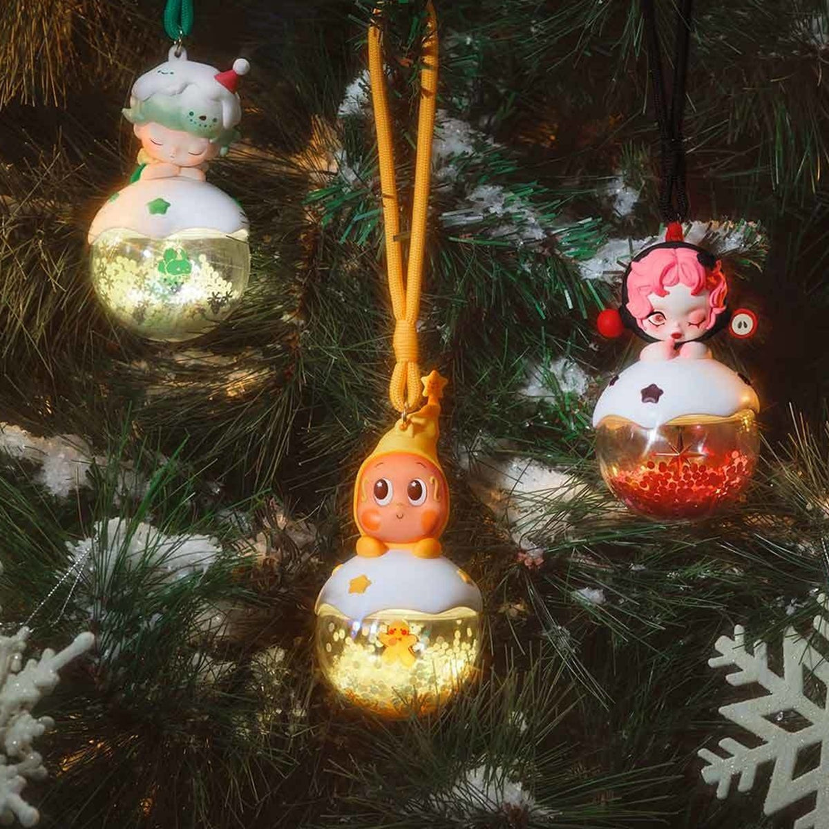 Apple of My Eye luminous pendant design examples illuminated on a tree