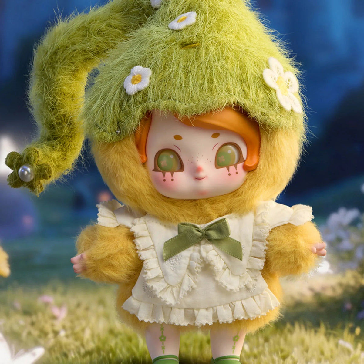 Gardener design example with green hat and floral details; random-box design is not guaranteed