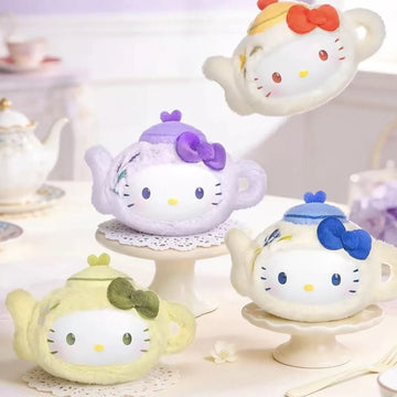 Teapot-shaped Hello Kitty plush design examples in a tea-table scene; pictured group is not supplied contents