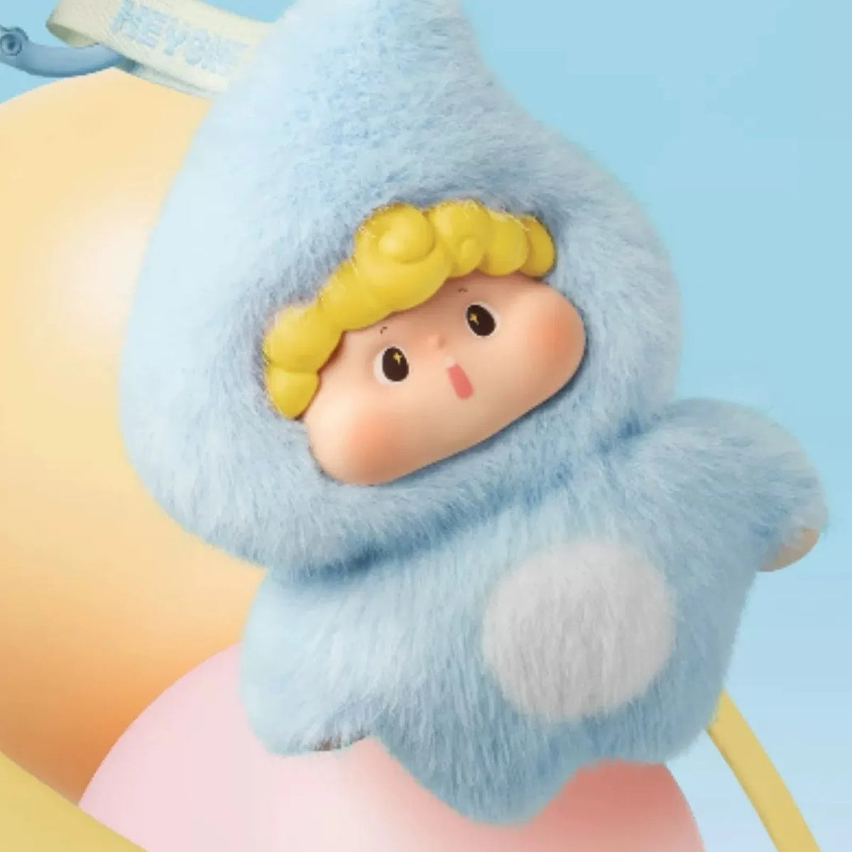 Hudodo Journey of Energy: blue pointed-costume design detail with yellow hair; random design is not guaranteed