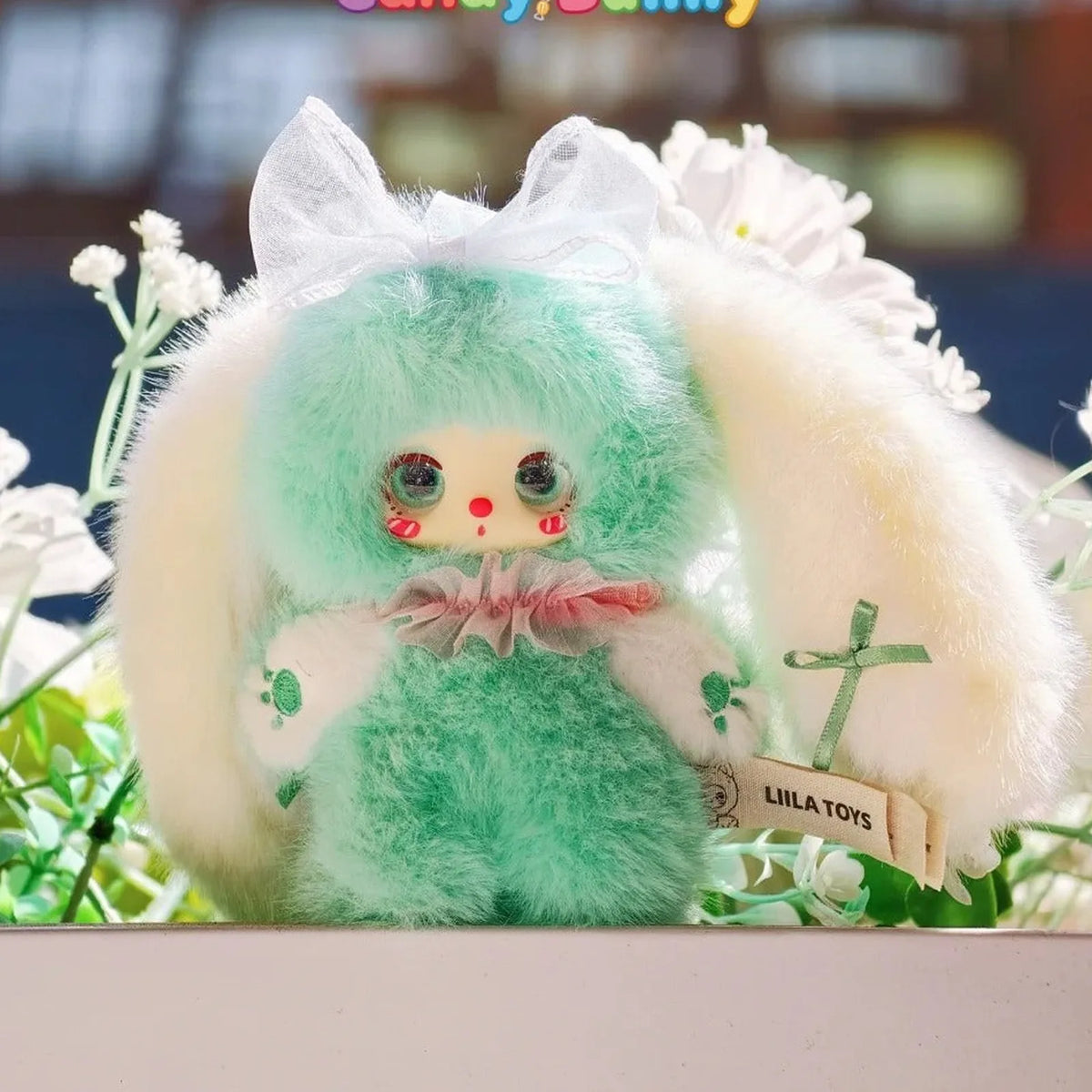 Green Rainbow Candy Bunny plush in a garden scene | KikiBuddies