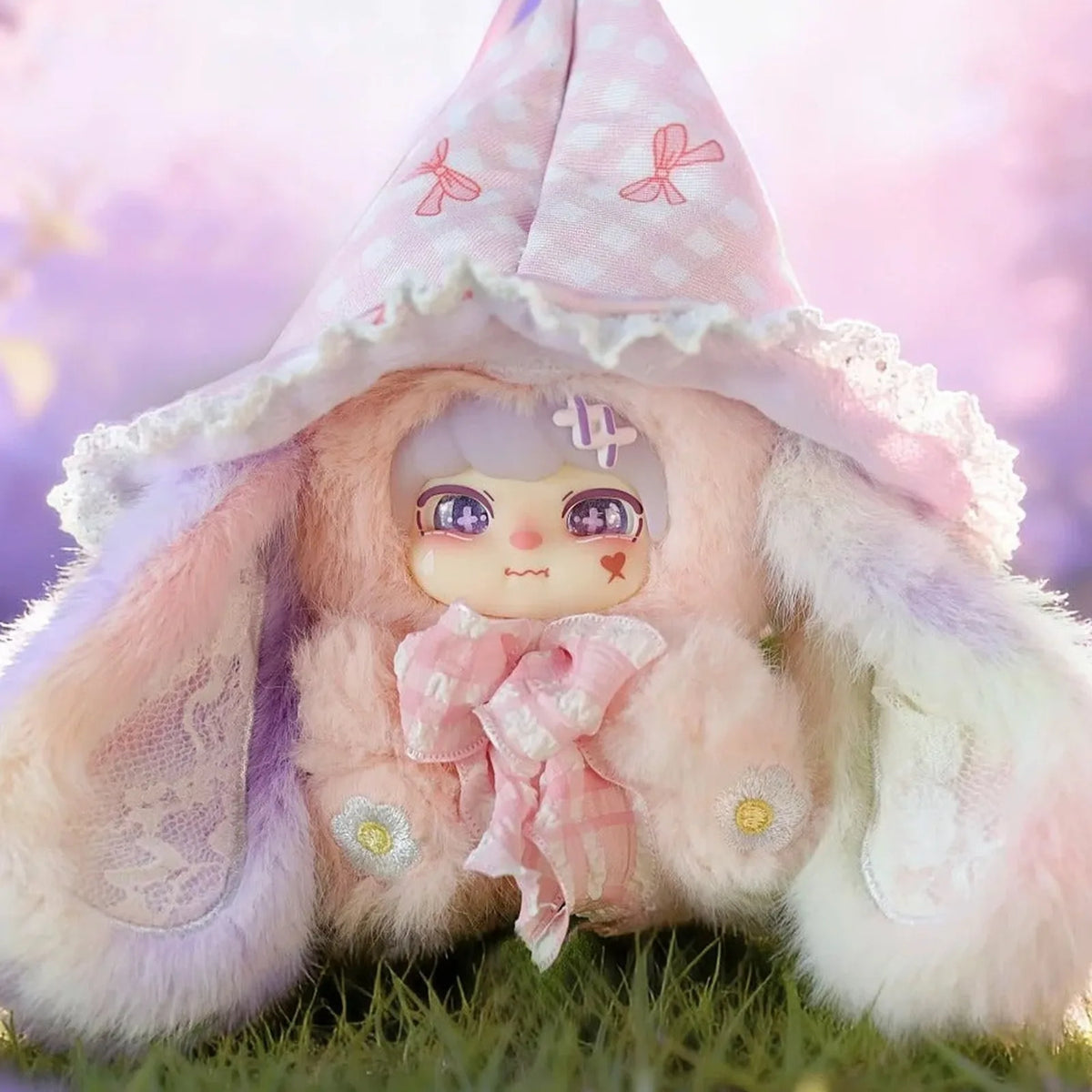 WAITING FOR THE BLOSSOM Lokiki plush design with pink pointed hat