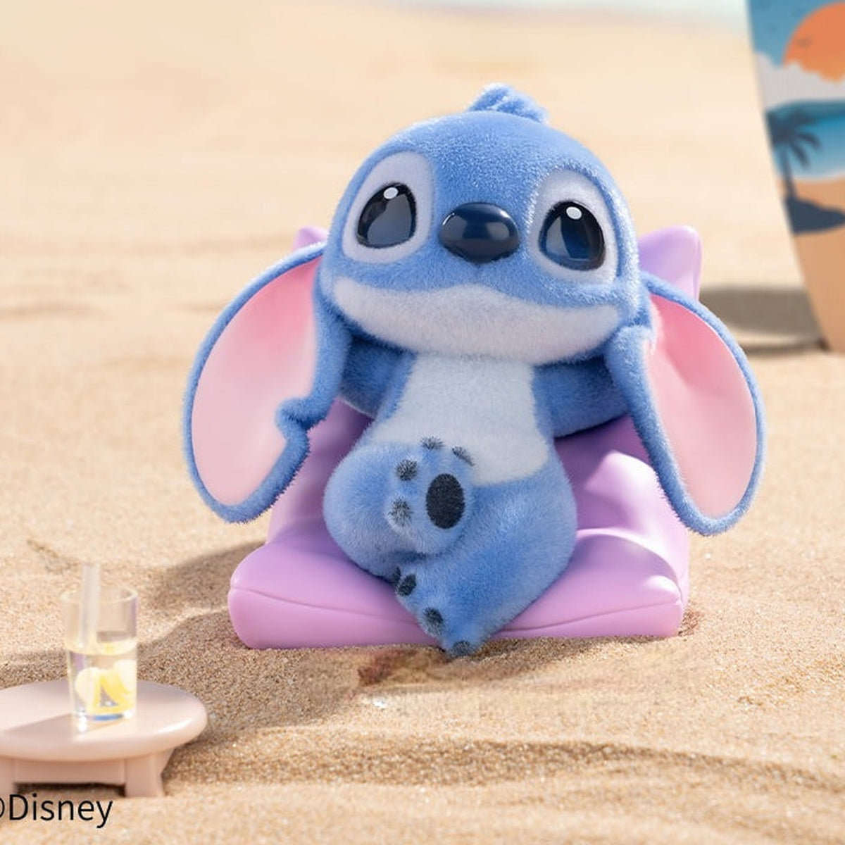 DSN Stitch Mischievous Daily Life Series Figure Blind Box - Stitch seated pink cushion figure example; illustrative series image, contents depend on purchase option