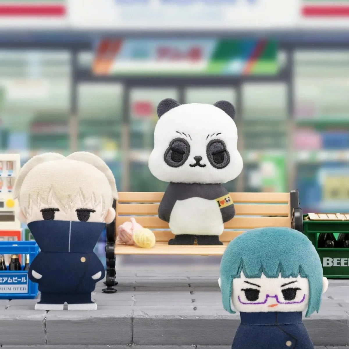 Jujutsu Kaisen panda and uniformed character plush brooches beside a bench; illustrative series group