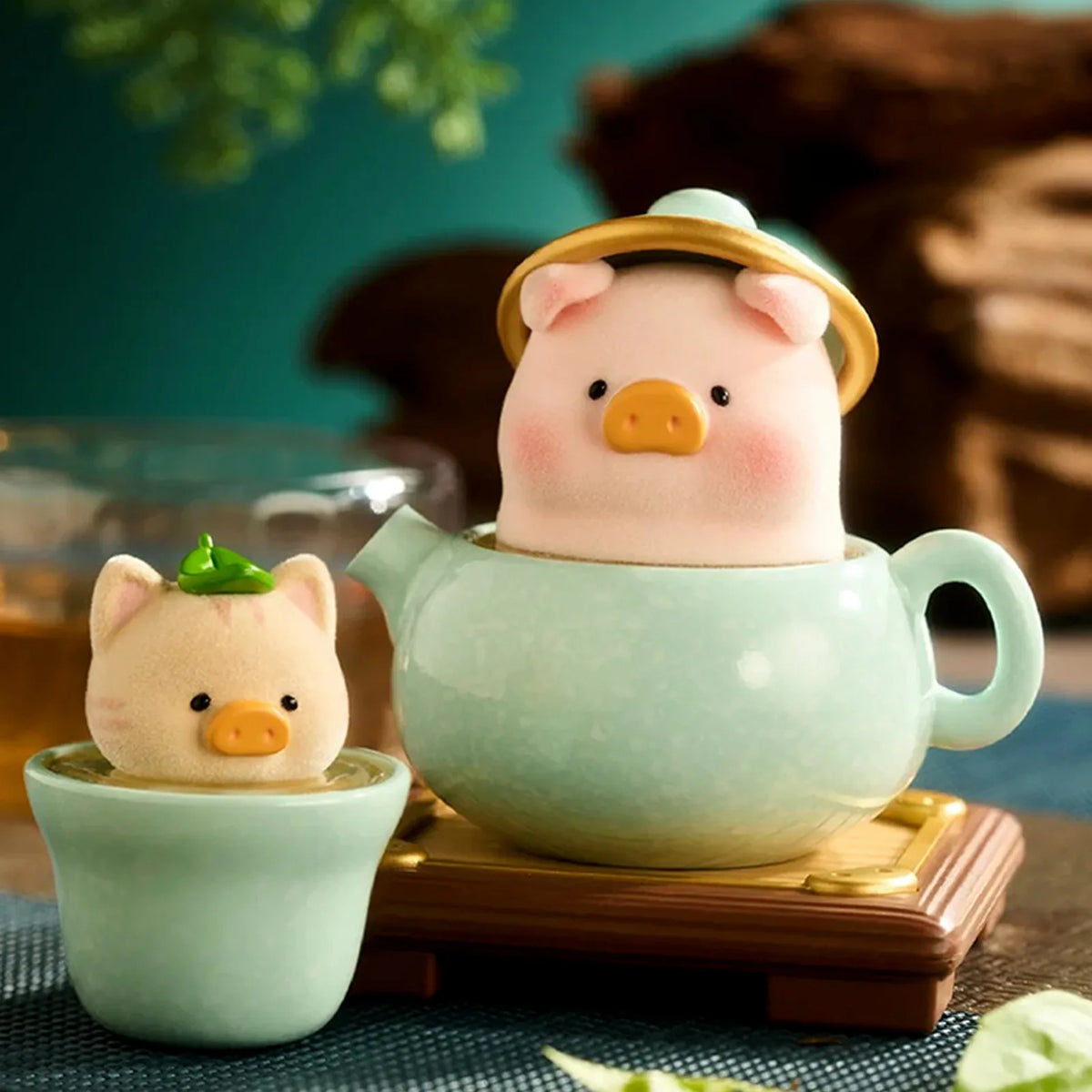 LuLu The Piggy Lu's Table Series Blind Box — Tea-cup themed piggy figure examples; series example, not a guaranteed selection