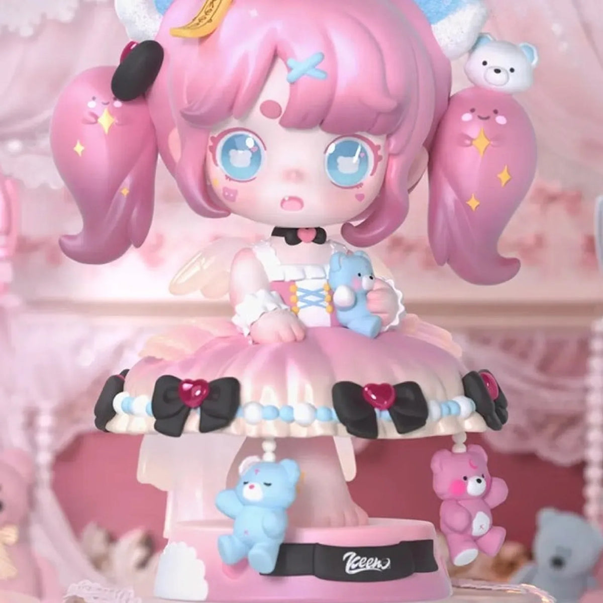 Keeno Miracle Feast pink figure and bear-decorated display-base detail; series example