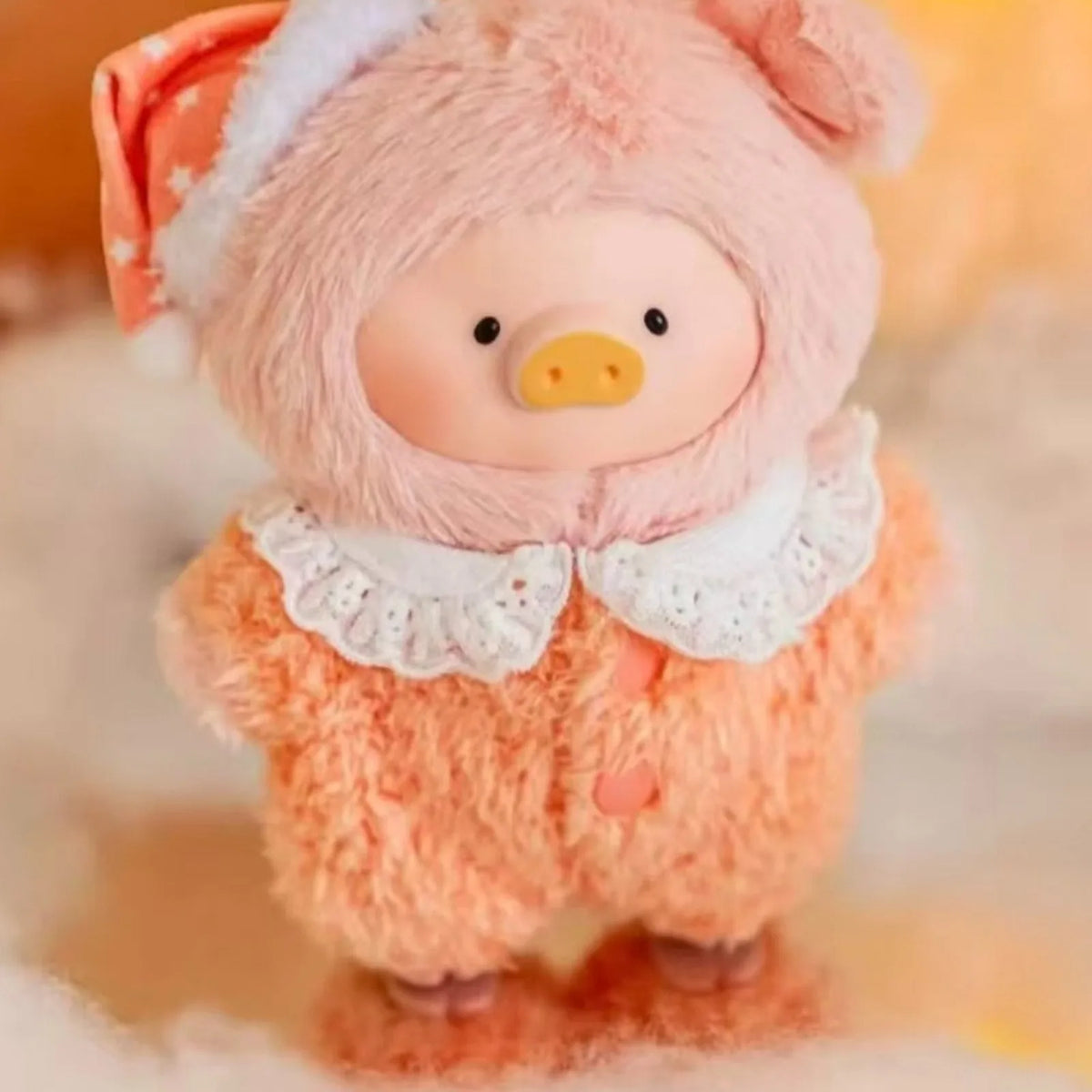 LuLu the Piggy Dreaming Wonderland orange plush design, costume and face detail crop