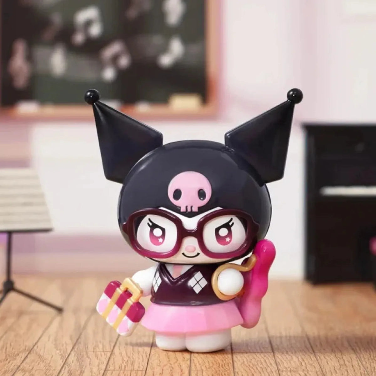KUROMI Sparkling Idol figure with glasses and a gift; series design example | KikiBuddies