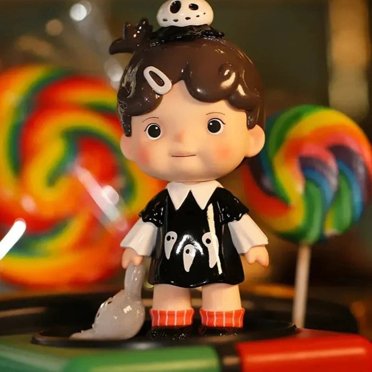 Little Team black-haired figure with a panda detail; series design example | KikiBuddies