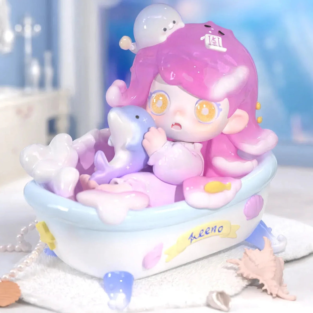 KEENO Wish on the Sea Breeze pink-haired figure in a sea-themed scene; series design example | KikiBuddies