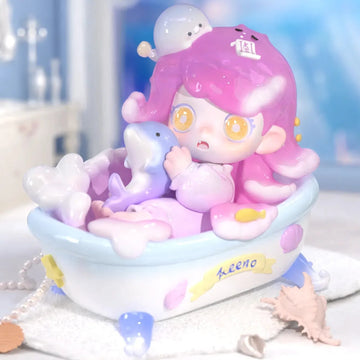 KEENO Wish on the Sea Breeze pink-haired figure in a sea-themed scene; series design example | KikiBuddies
