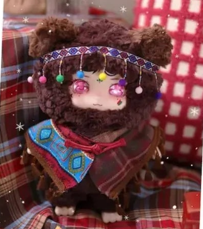 Complete brown LOKIKI plush design example with full ears, beaded headband, face, hands, patterned cape and feet; original source photograph; random design not guaranteed; random purchases do not guarantee this design
