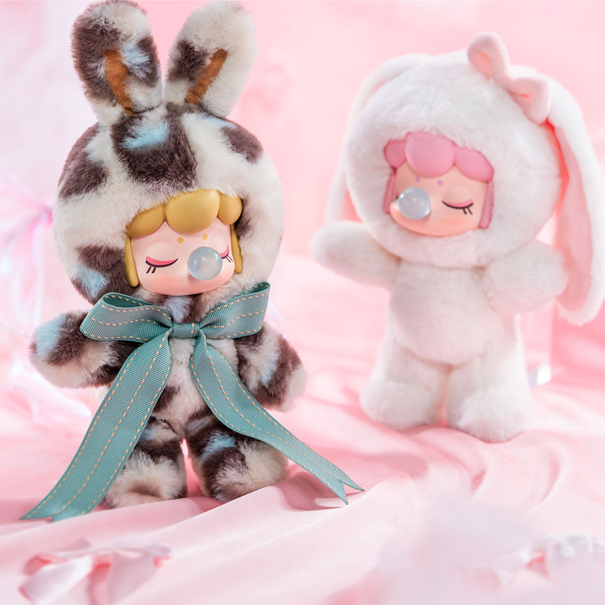 Nanci Shining Bunny — leopard and floppy-ear plush designs shown together; two dolls are not included in one random box