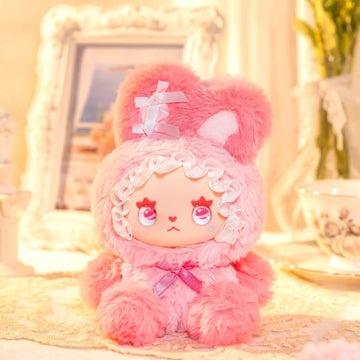 Pink bunny-outfit plush doll design; exact series reference, random purchase does not guarantee pictured design