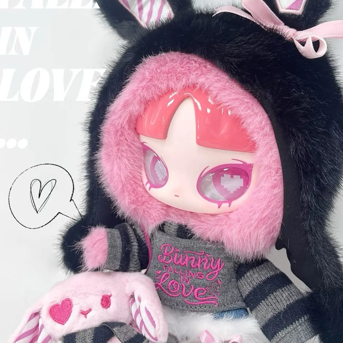 Bunny Falling in LOVE plush face and pink hood close-up; cropped detail view