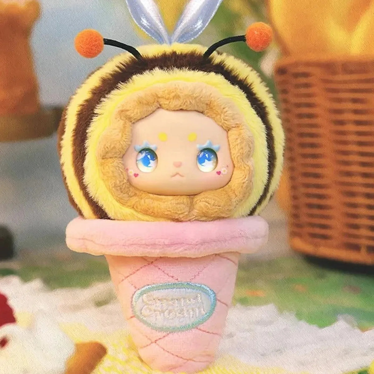 EMMA bee-costume plush in an ice-cream cone design; series design example | KikiBuddies