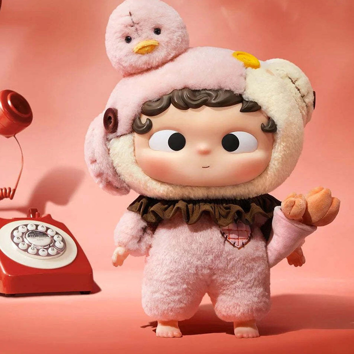 OZAI I'm Waiting - pink hood design, front view with small bird detail | KikiBuddies