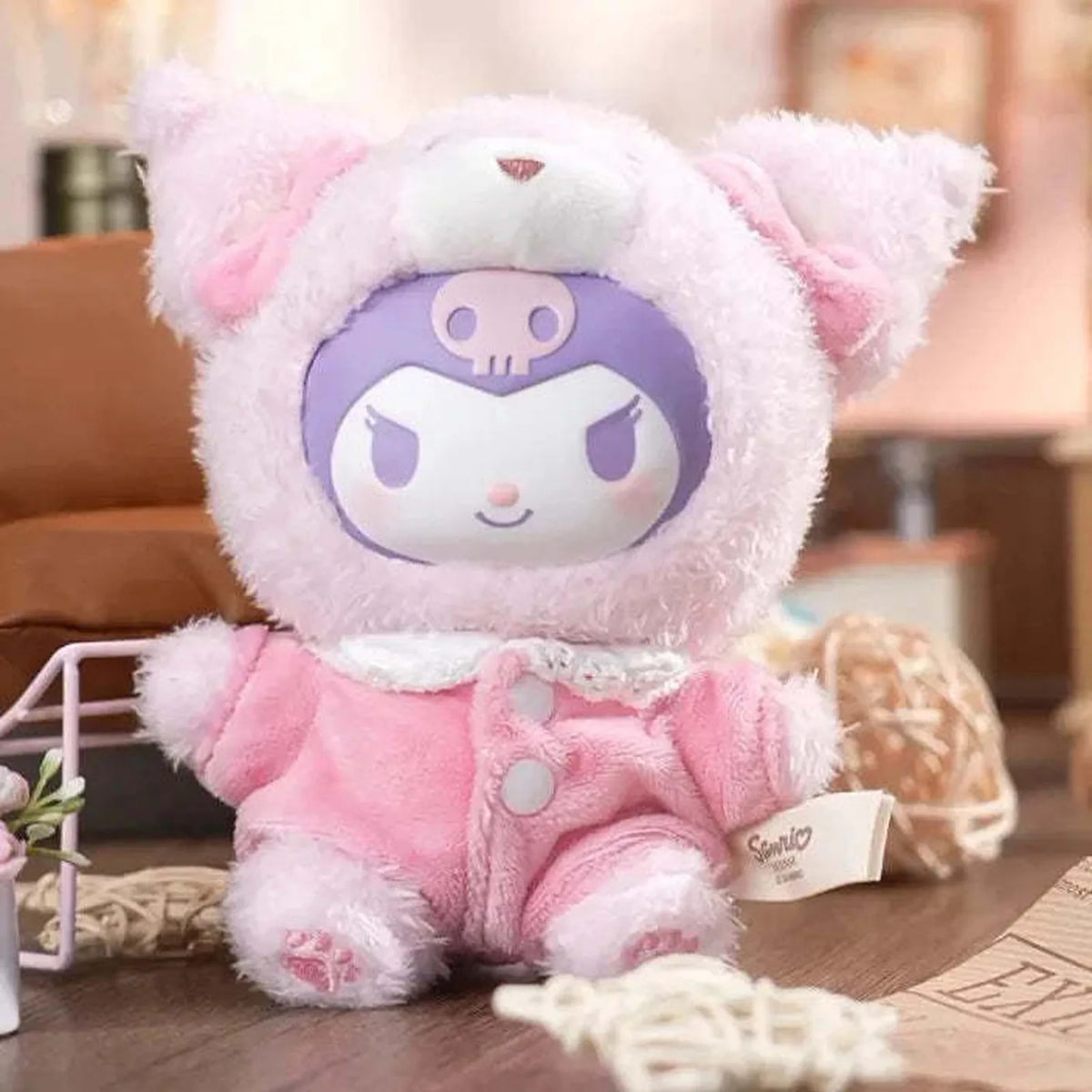 KUROMI Peach Berry plush seated detail with original Sanrio tag; surrounding props not included