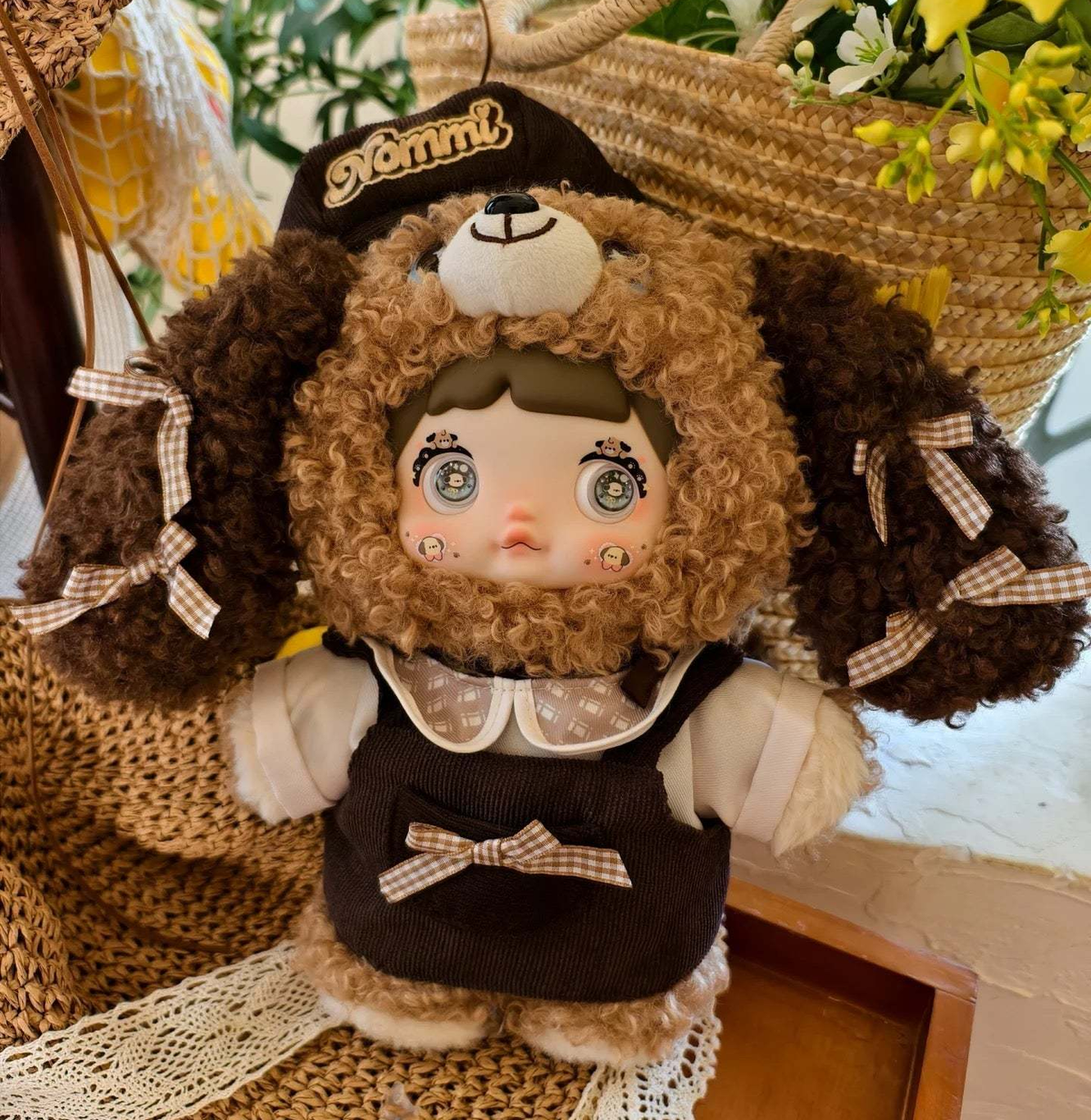 Chocolate Puppy plush doll front view with full Nommi cap, puppy hood, face, hands, outfit and feet; original source photograph