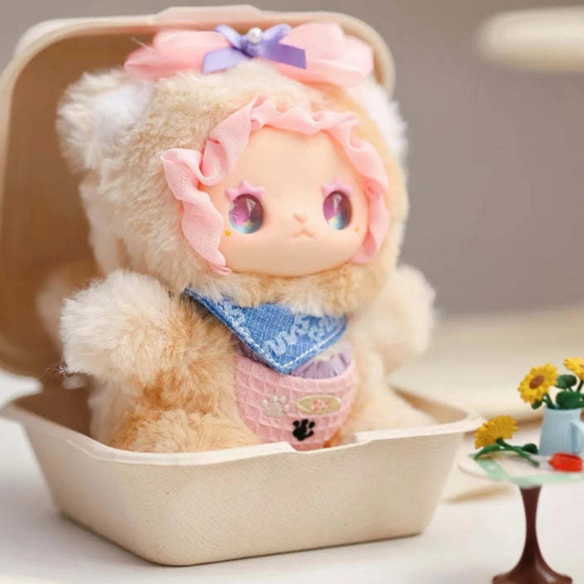 Lovely Emma Pocket Zoo cream animal-costume plush in a tray display; example design
