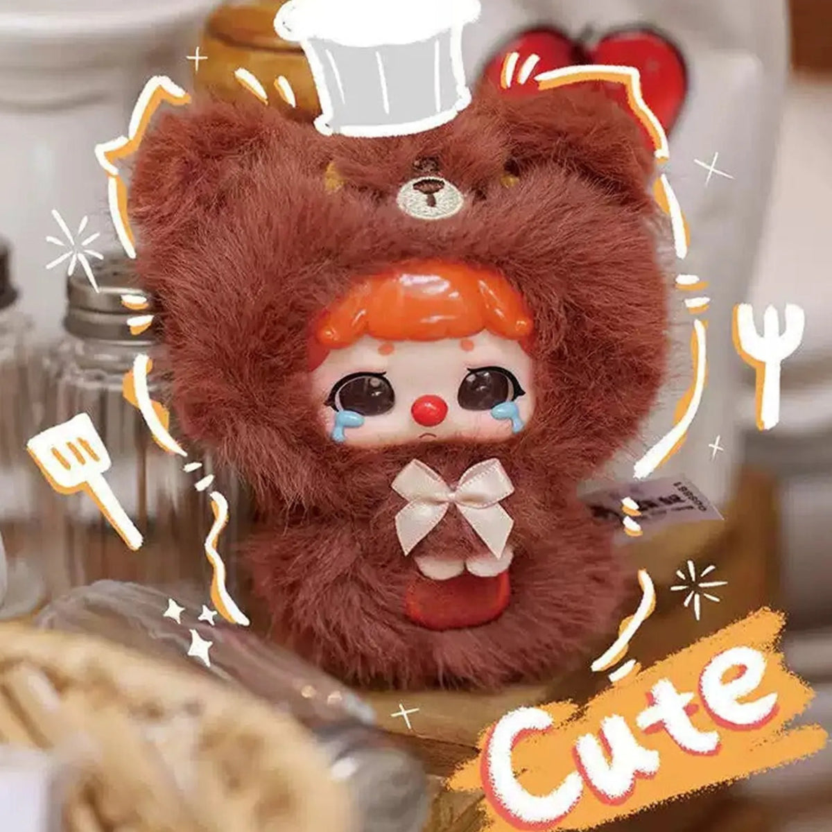 Brown animal-costume plush character in a styled scene; exact series reference, random purchase does not guarantee pictured design