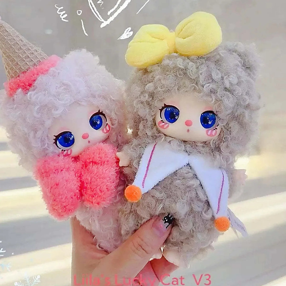 Two LiiLa Lucky Cat V3 plush dolls shown together as a series example