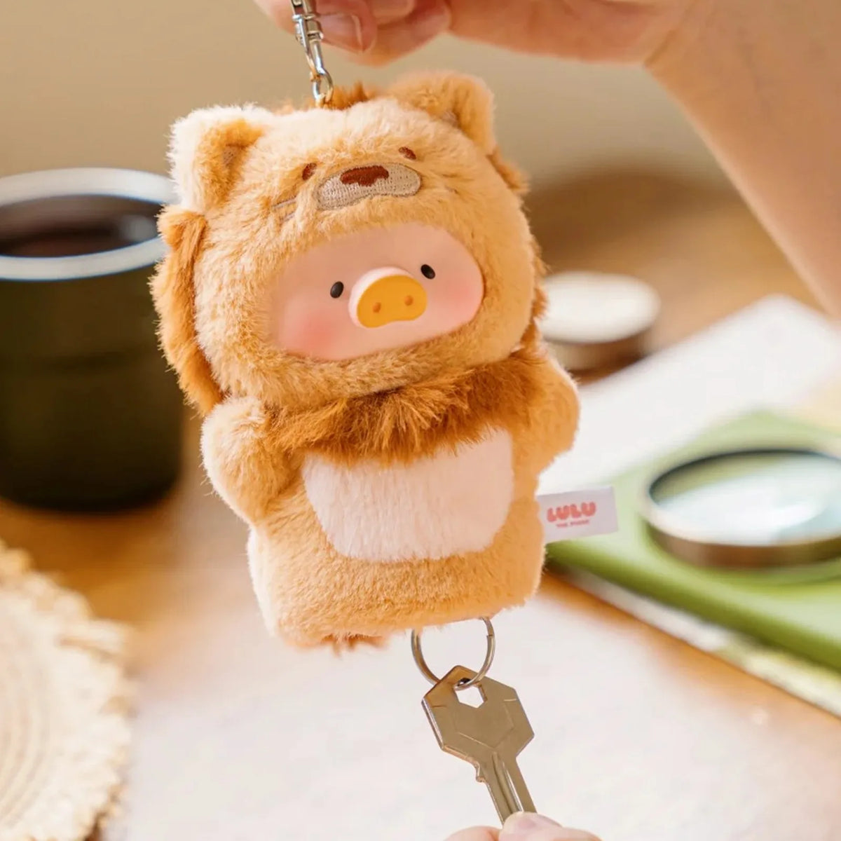 LuLu Cutest Butler animal-costume key cover showing the lower key attachment