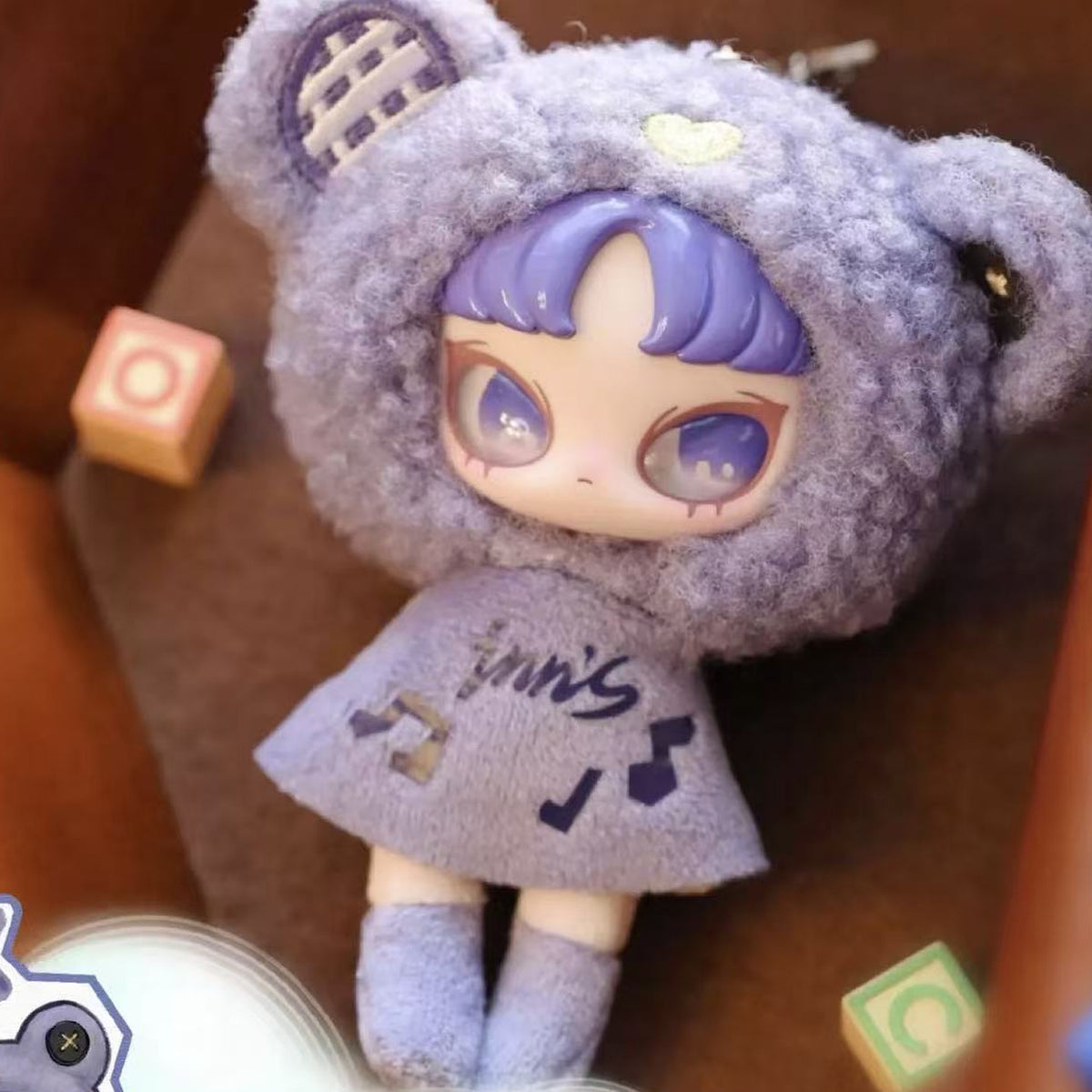 B311-06 Purple character face and embroidered outfit detail; mini plush pendant series design reference, random purchase does not guarantee pictured design