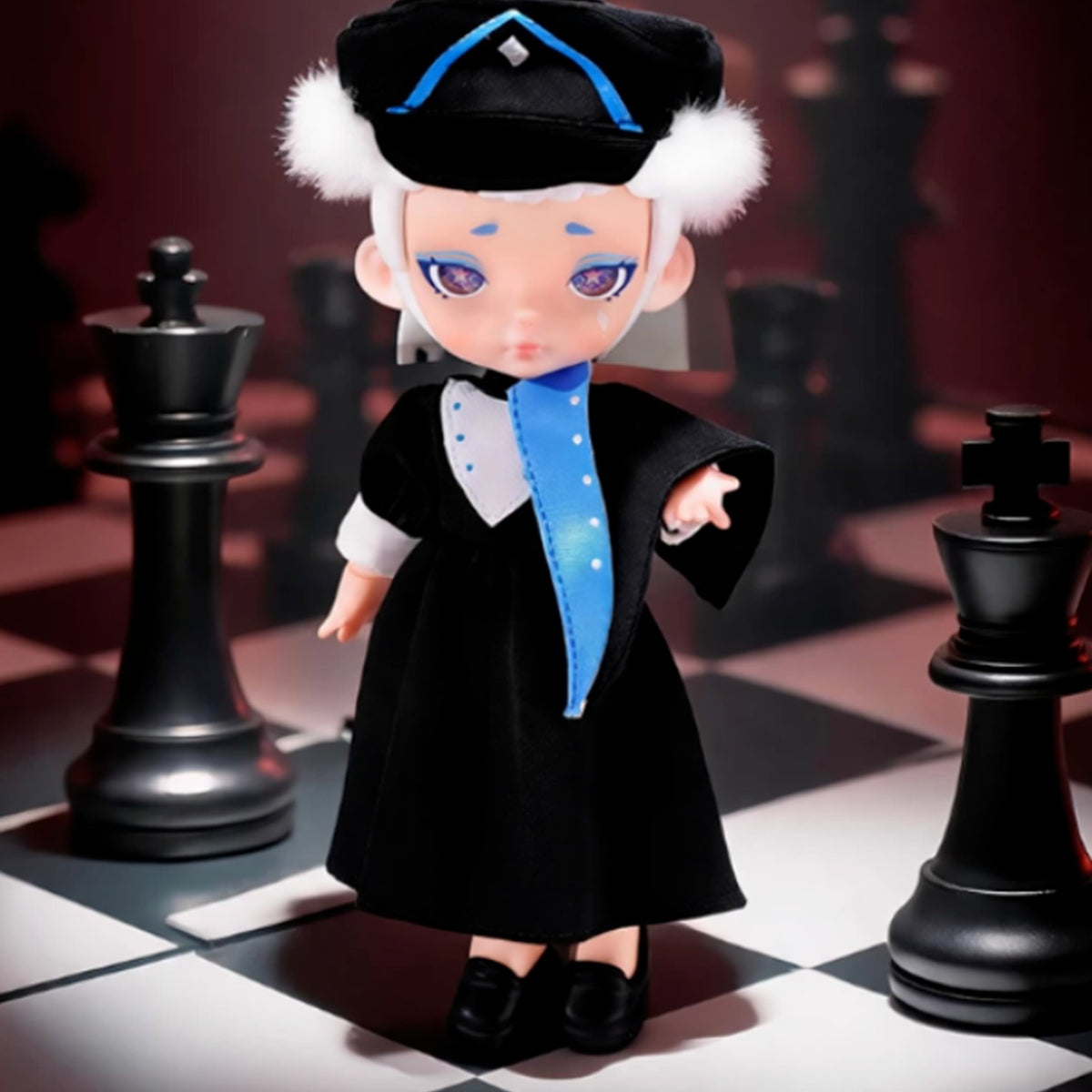 LAURA Chess Black Knight outfit detail in a blue-accented black cap and coat; series reference, not a guaranteed random character