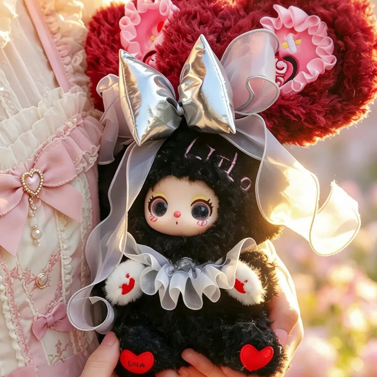 Liila Star Crown Bunny Princess black rabbit plush held for scale; detail example