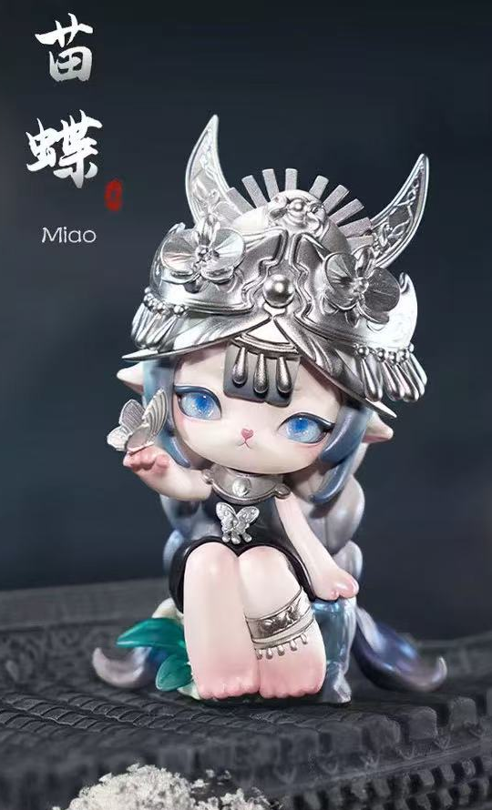 Ninimo Whispering Seasons Miao design example with complete silver headgear, face, body, hands, feet and hair ends; random purchases do not guarantee this design