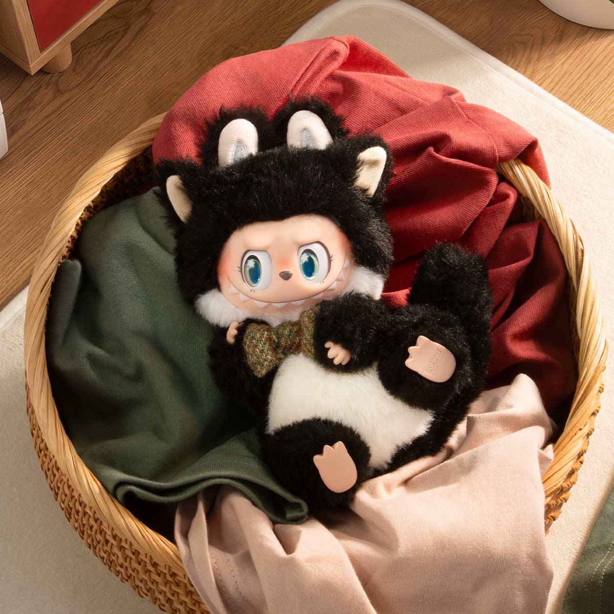 THE MONSTERS CAT MODE ON Cow Kitty vinyl plush pendant in its original product scene; props not included