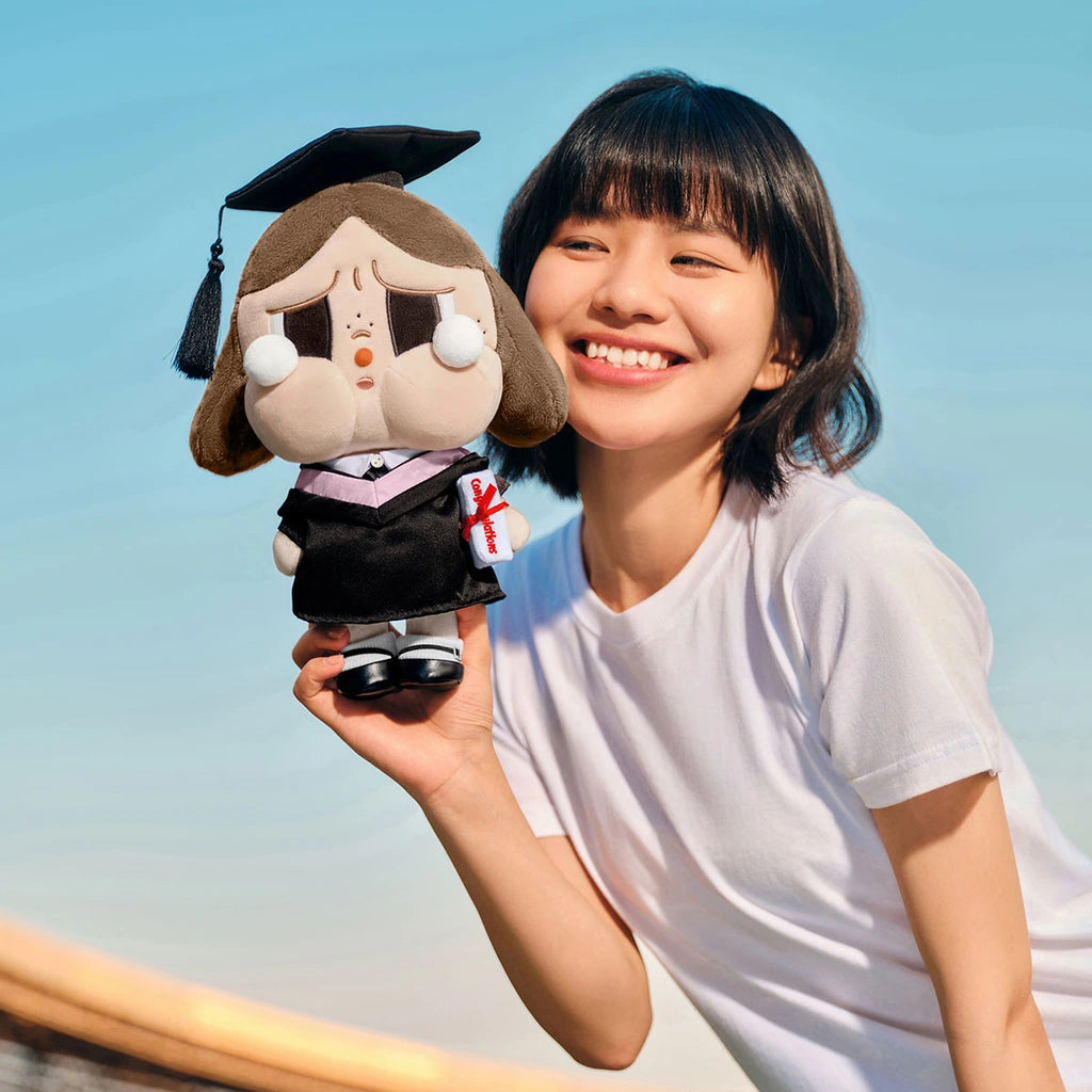 CRYBABY Sunset Concert Series-Plush Doll held beside a person for scale context