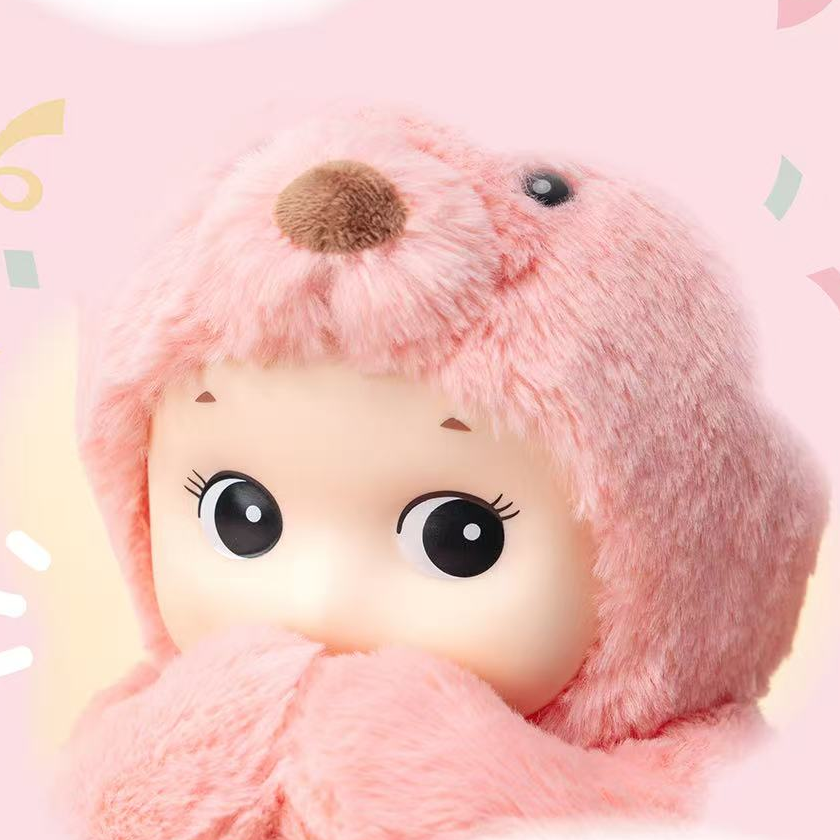 Side-angle detail of Sonny Angel Cuddly Bear Pink face, bear hood and posed arms