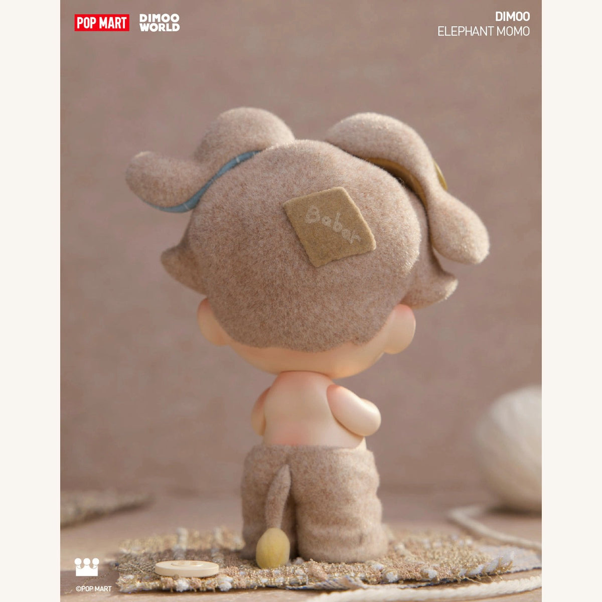 DIMOO 9th Anniversary Elephant Momo confirmed figure, back view showing the elephant hat and tail