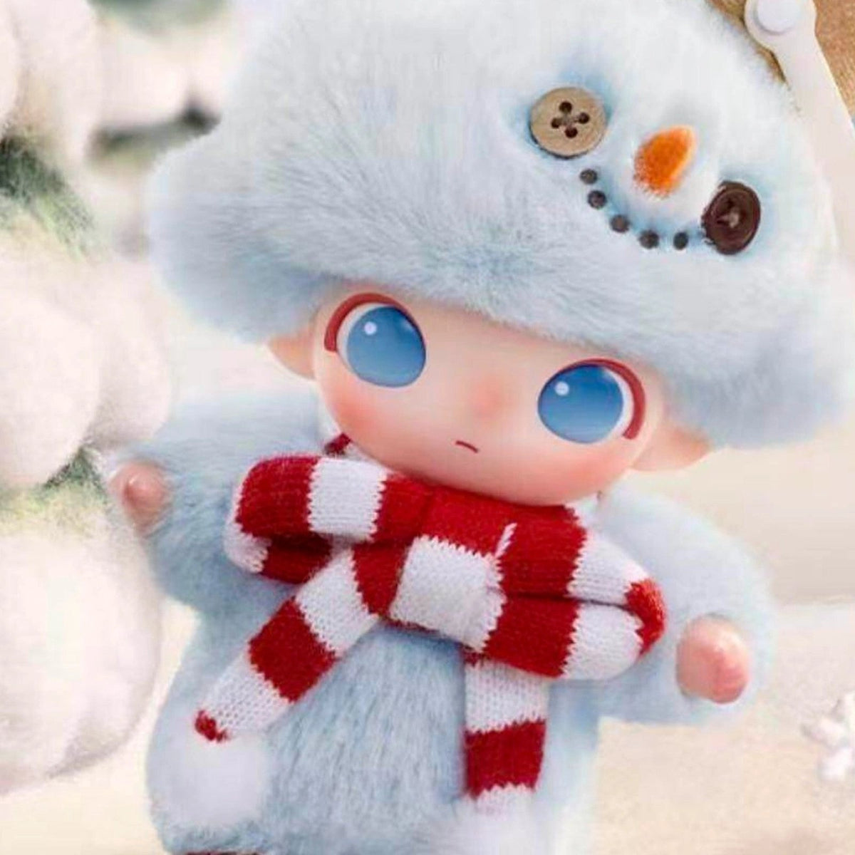 DIMOO Snowman vinyl plush hanging collectible, close view of the snowman hat, face and red striped scarf