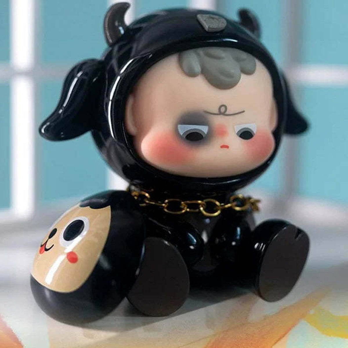 Diudiu Baby Hello Childhood Series Blind Box - Complete black-outfit seated figure example; random design not guaranteed