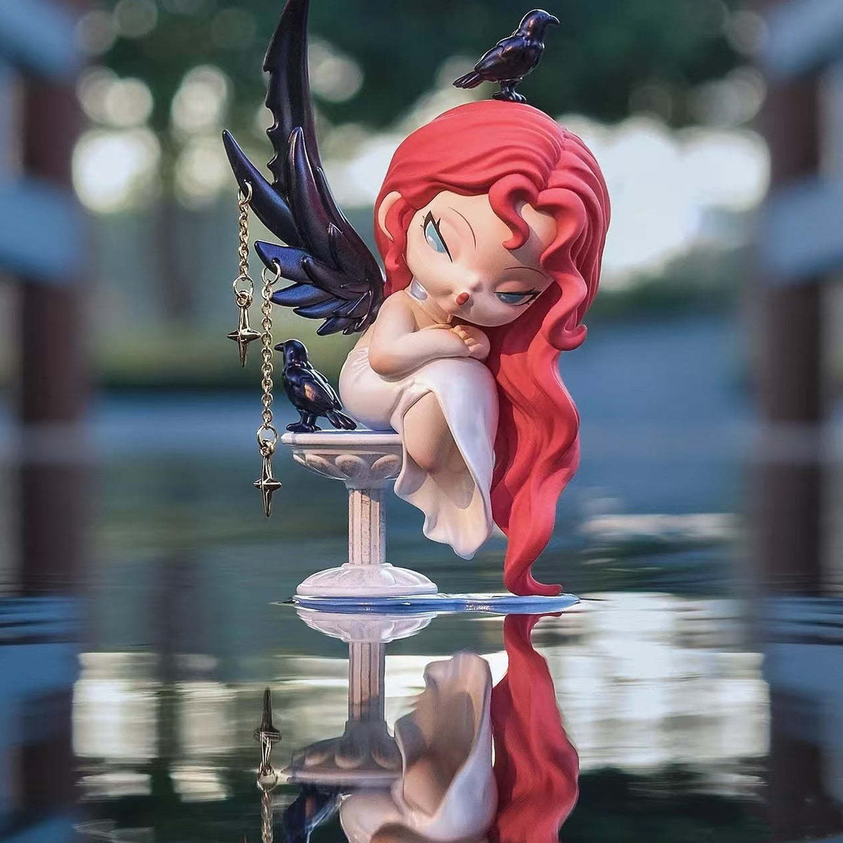 DODO NAMI Nightmare Core Series Figures, Blind Box - Seated red-haired figure detail with upper wing tip cropped; random design not guaranteed