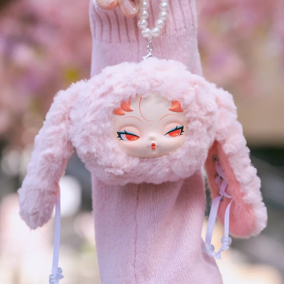 DODO Nami Twinkle Bunny Series Plush Pendant Blind Box - Pink bunny plush pendant head and ears; lower hanging cords cropped; display props not included; random design not guaranteed