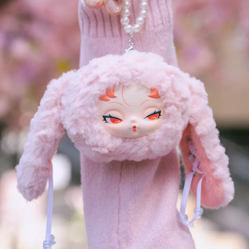 DODO Nami Twinkle Bunny Series Plush Pendant Blind Box - Pink bunny plush pendant head and ears; lower hanging cords cropped; display props not included; random design not guaranteed