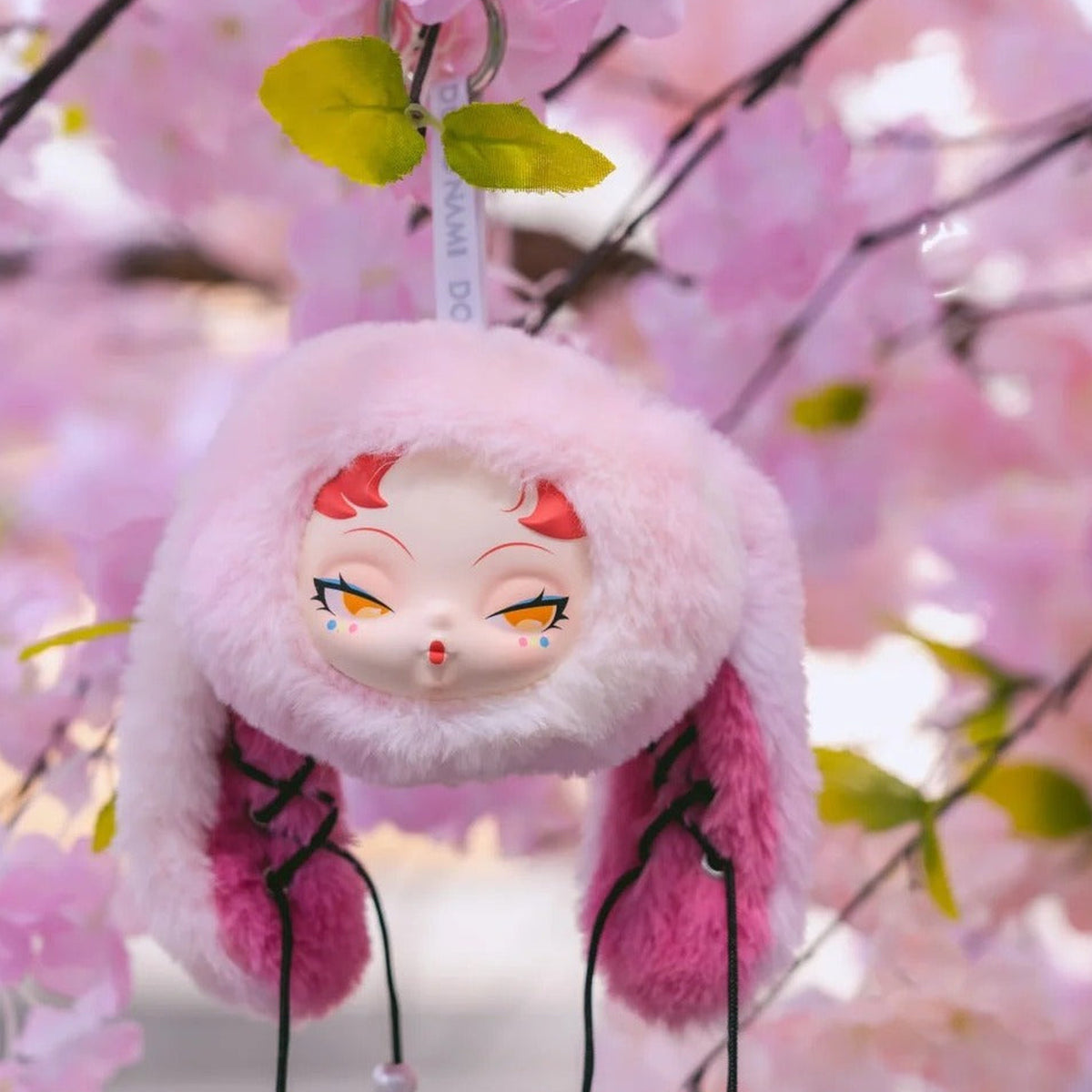 DODO Nami Twinkle Bunny Series Plush Pendant Blind Box - Pink bunny plush pendant head and ears; lower hanging cords cropped; display props not included; random design not guaranteed