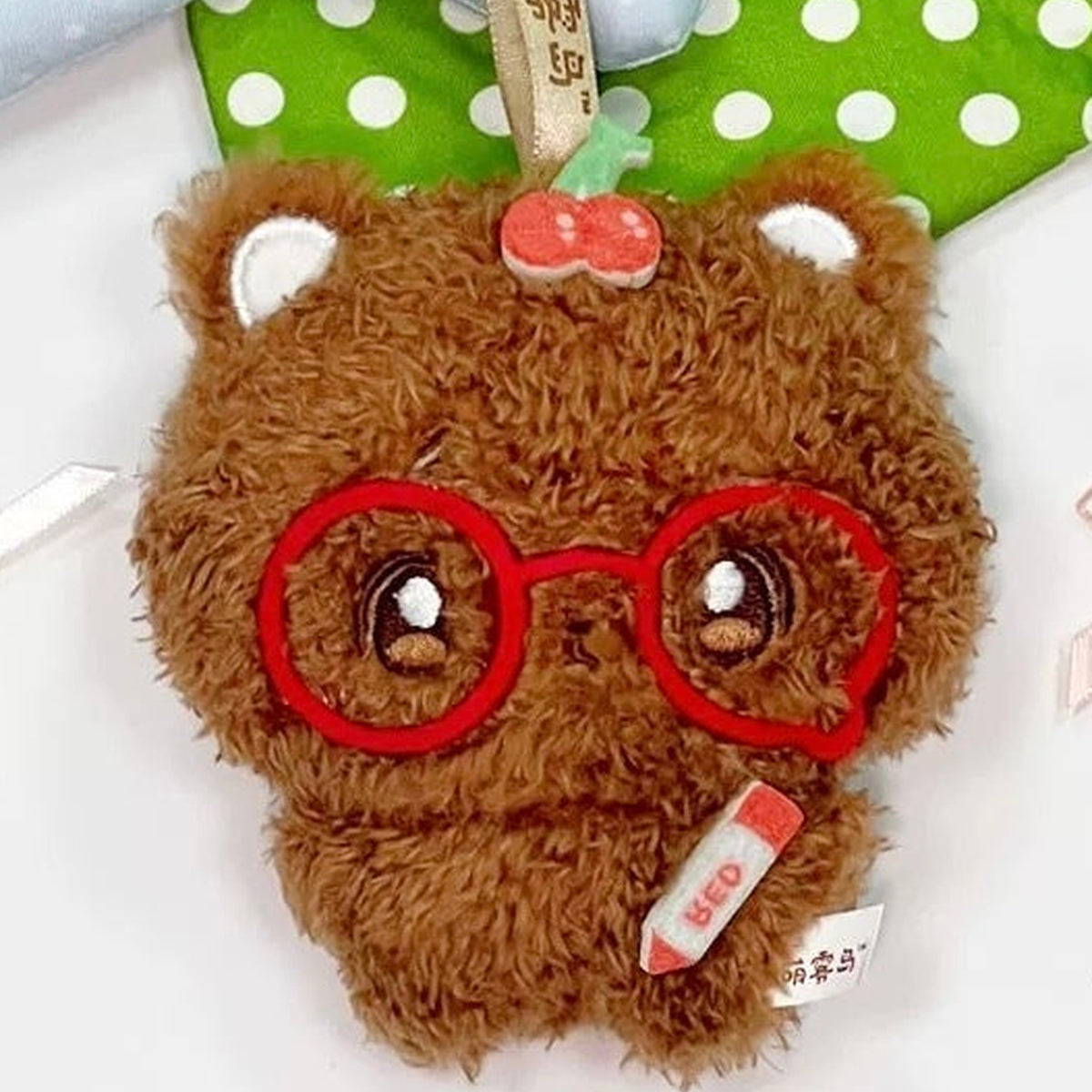 Dodowo Mogutoto Series Plush Pendant Blind Box - Complete brown plush pendant body with upper strap cropped; random design not guaranteed