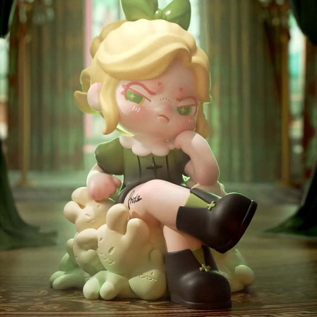 Dora An Ideal World Series PVC Figures, Blind Box - Blond Dora figure in green outfit seated with cat-shaped base; upper green bow cropped; random design not guaranteed; display props not included
