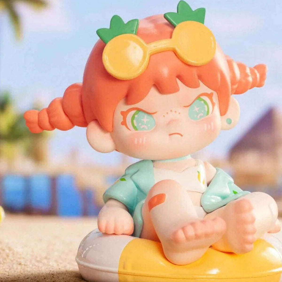 Dora Escape Plan Series Figures, Blind Box - Dora pineapple-glasses seated design detail; yellow float-shaped base cropped at lower and right edges; example design, not guaranteed in random boxes