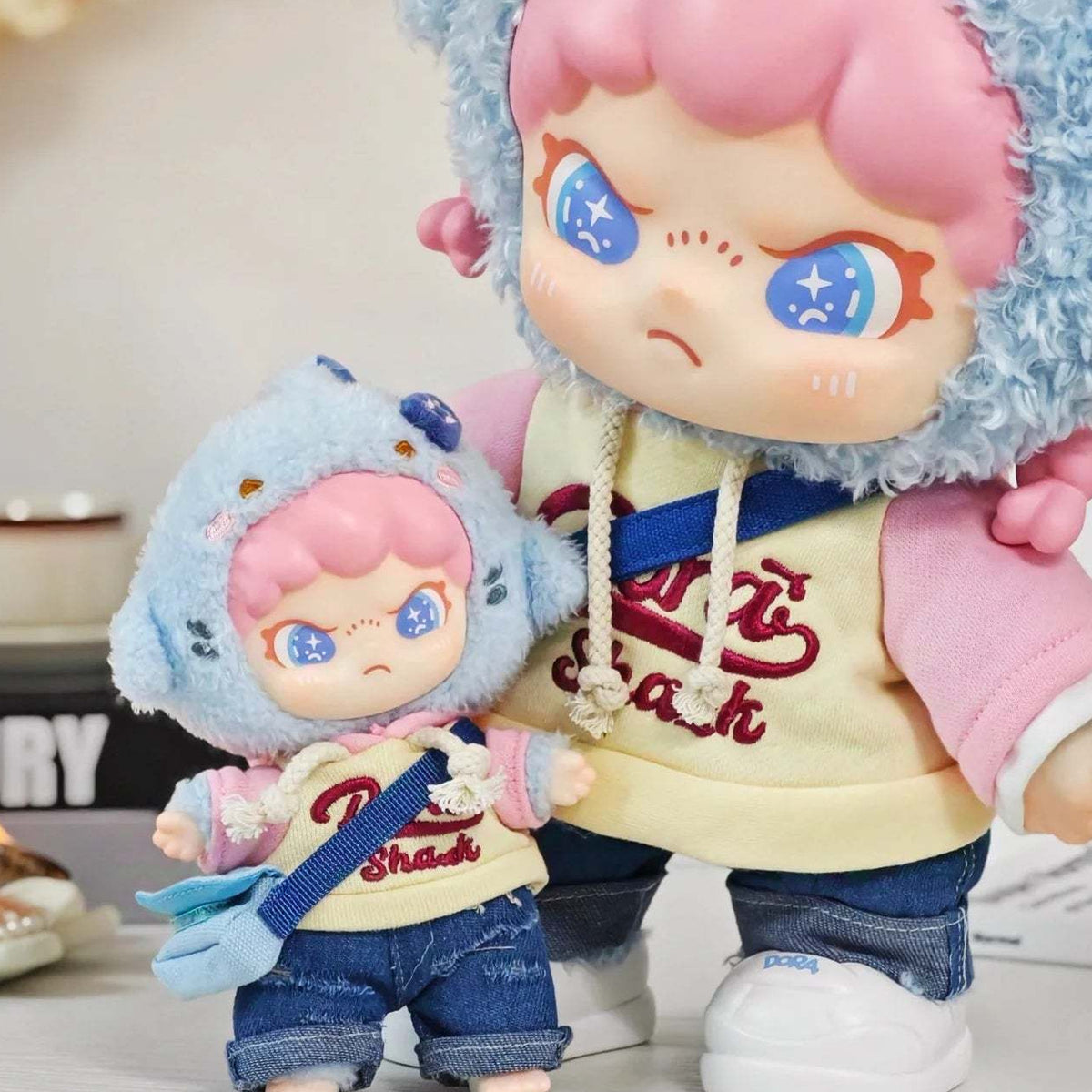 Dora Sharky Lala Girl Vinyl Plush Doll & Pendant - Small pendant and large doll comparison, partly cropped; selected option supplies one item; selected format supplies one item